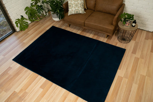 Dark blue shag rug, square floor covering with soft long pile