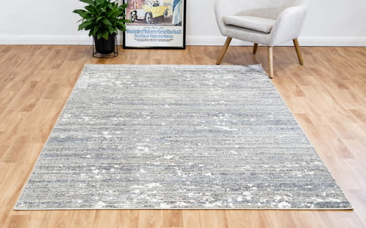 Kali contemporary rug, light grey with subtle speckled texture, rectangular 44