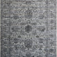 Grey area rug with distressed abstract pattern and border edge detail