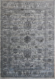 Grey area rug with distressed abstract pattern and border edge detail