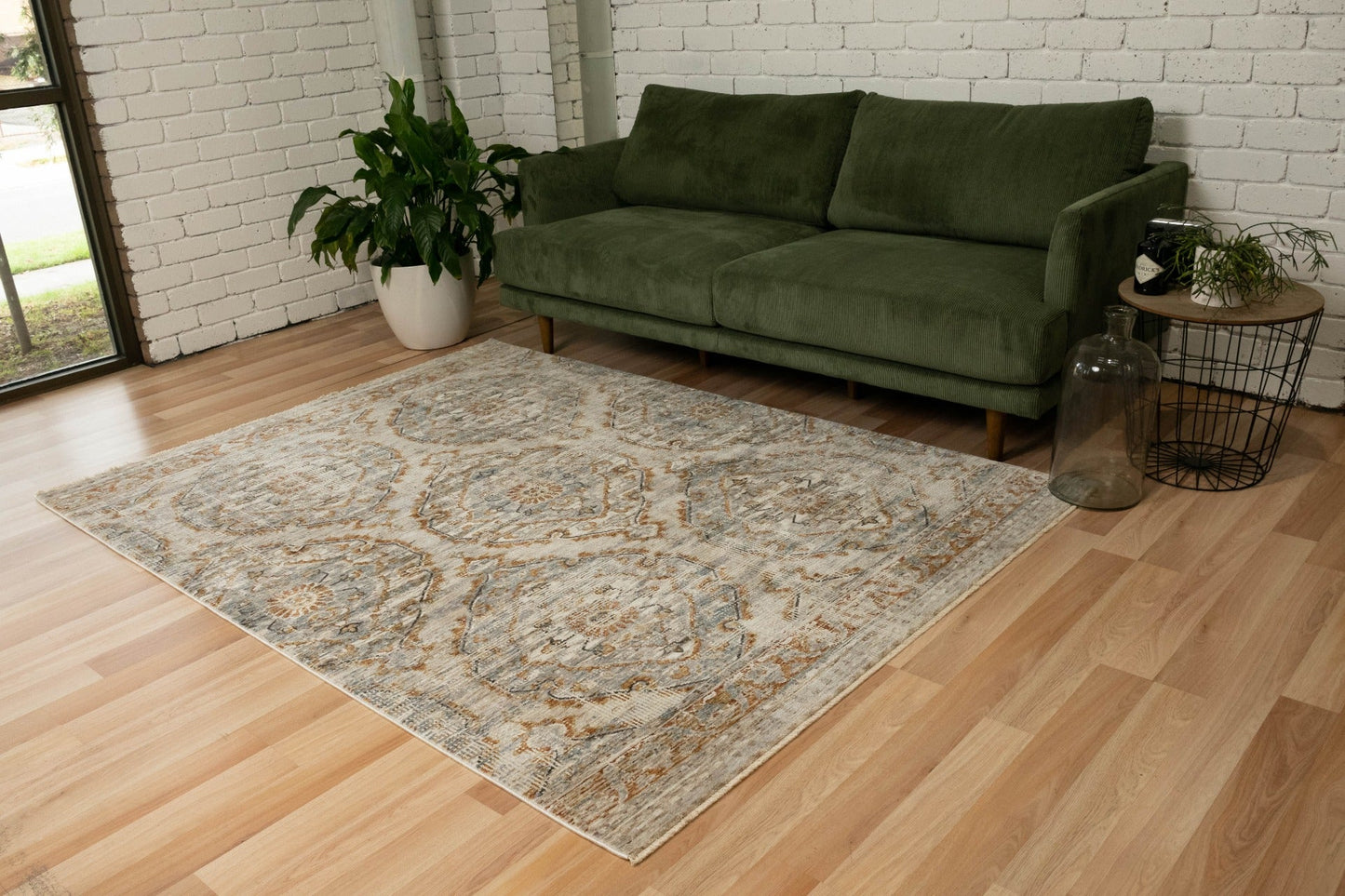 Matana thick floor rug with distressed ornate pattern, light gray and rust accents