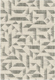 Geometric area rug with gray and gold abstract pattern on light background
