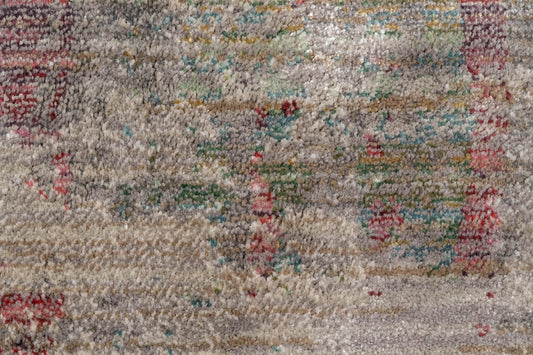 Multicolor abstract area rug with low pile and woven speckled pattern, light beige base